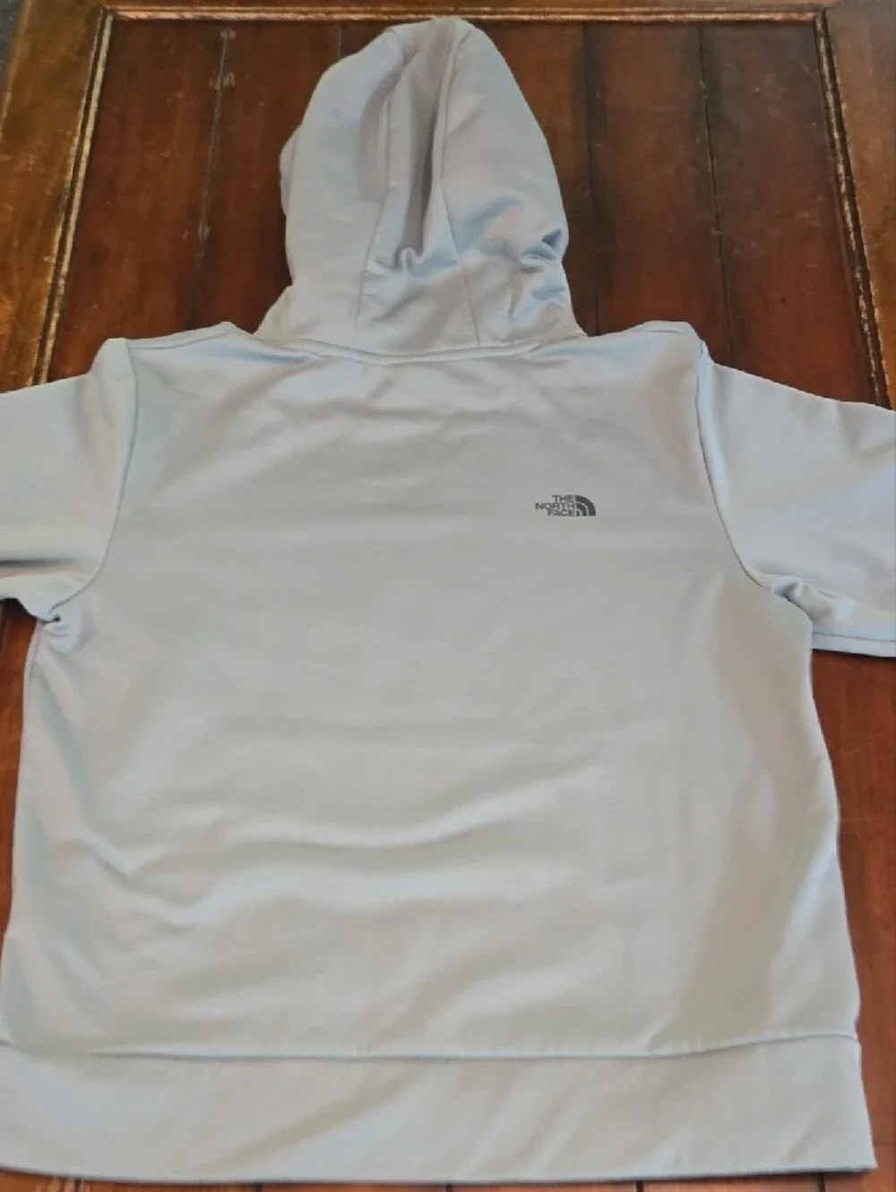 The North Face Pale Blue Pullover Hoodie with Gray Logo